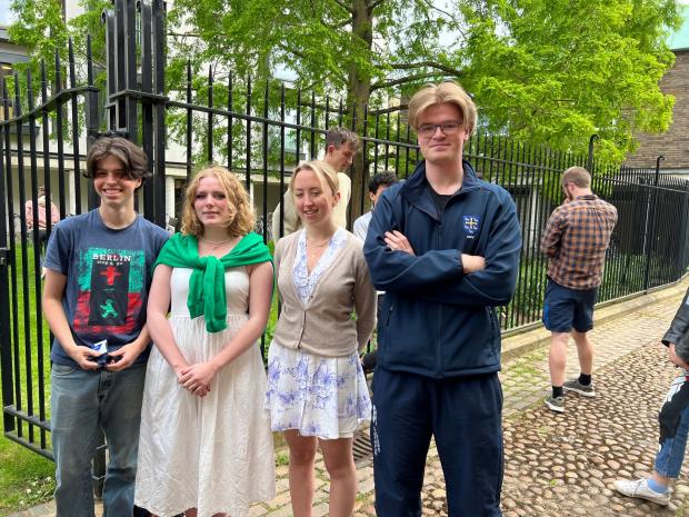Oxford Mail: University College students Charlie Gundy, 19, Mytanwy Tayler, 18, Isabella Penna, 19, and Peter Moor, 20, waited outside in the hopes to meet the Prince. 