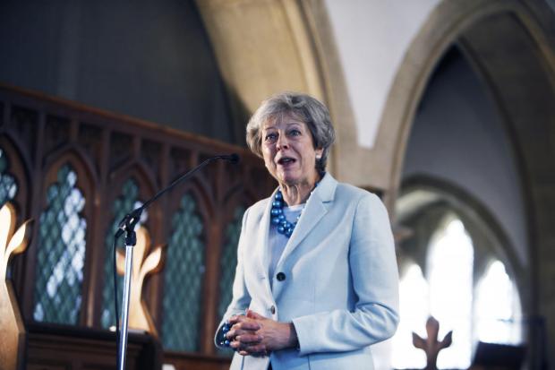 Oxford Mail: Former Prime Minister Theresa May during a visit to Oxfordshire in 2019. Picture: Ed Nix