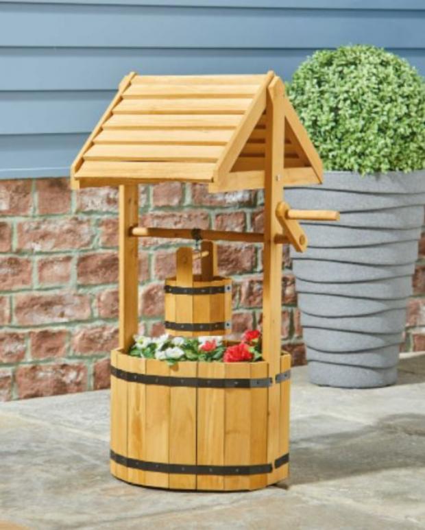 Oxford Mail: Natural Wooden Wishing Well Planter (Aldi)