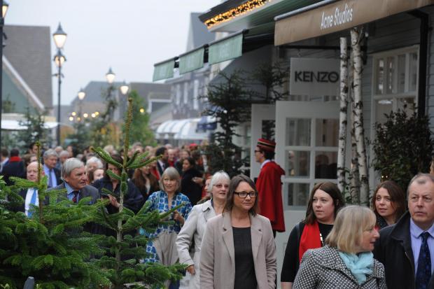 Oxford Mail: Shoppers at Bicester Village. Picture: Jon Lewis