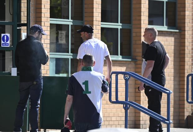 Oxford Mail: Ashley Northmore (left), Steven Ellis (centre, in baseball cap) and Shannon Power (right) outside Swindon Magistrates' Court on Wednesday. Photo: Dave Cox.