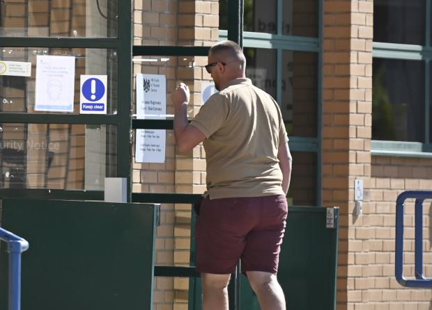 Oxford Mail: Matthew Hams enters Swindon Magistrates' Court. Photo: Dave Cox.