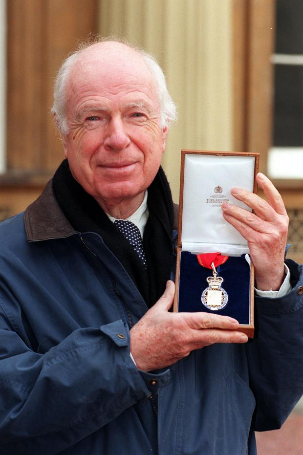 Oxford Mail: File photo dated 4/11/1998 of Peter Brook outside Buckingham Palace after receiving the Insignia of a member of the Order of the Companions of Honour from the Queen. Picture: PA 