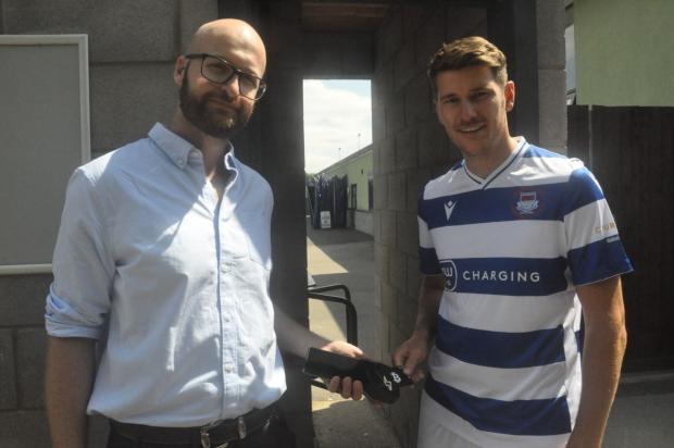 Oxford Mail: Matt Stuart-White, business development executive at CoinCorner, with Oxford City’s Josh Ashby