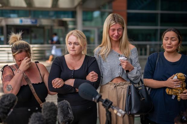 Oxford Mail: Hollie Dance (second left) surrounded by family and friends, outside the Royal London hospital in Whitechapel, east London