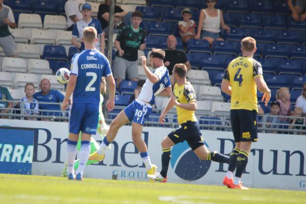 Aaron Collins touches the ball past Simon Eastwood in the build-up to Bristol Rovers' winning goal Picture: Darrell Fisher
