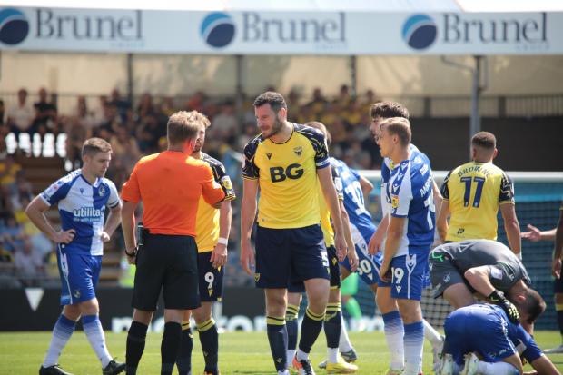 Elliott Moore questions a decision during Oxford United's defeat at Bristol Rovers Picture: Darrell Fisher