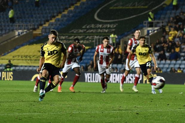 Cameron Brannagan scores Oxford United's second-half penalty against Lincoln City Picture: David Fleming