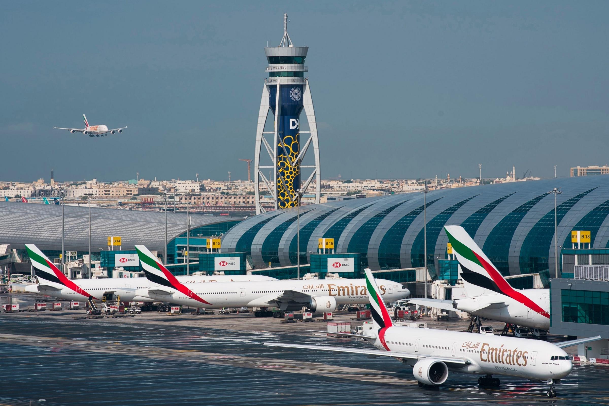 Is Dubai International Airport open amid rain and flooding?