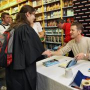 Talk show host Jeremy Kyle signs copies of his new book at Borders bookshop, Oxford, in June 2009. Picture: Antony Moore