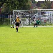 Berinsfield’s Max Palmer fires home to complete his hat trick Picture: Richard Underwood