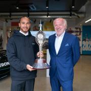 Lewis Hamilton receives the Hawthorn Trophy from David Richards