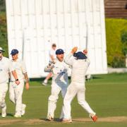 Oxfordshire captain Jonny Cater (second from right) congratulates George Tait. Picture: Thom Airs