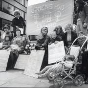 WOMEN across the city gathered to commemorate victims of abuse in May 1976. 
Mothers and their children demonstrated outside the County Hall buildings, in New Road, as a wreath was laid by the Women’s Aid refuge. 
The