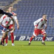 Tom Craddock scores a penalty against Stevenage