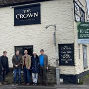 The steering committee group by The Crown pub in Marcham which they intend to run as a community business