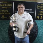 Kevin Baker with the Oxford Singles trophy