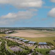 Green light for Bicester Motion’s new £50 million Innovation Quarter to boost future pioneering mobility discovery – aerial CGI looking across the 444-acre estate, racetrack and airfield showing seven new HQ buildings