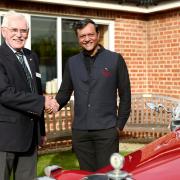 MG Car Club President John Day welcomes Daman Thakore to The MG Car Club, Abingdon.