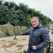 Rugby world champion Phil Vickery and Spike the world's most popular penguin at Birdland
