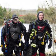 Andy Pickering, John Waterhouse, Kirill Palamartchouk and David Brock took part in the annual New Year's Day dive in Hinksey Lake