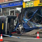 A Vauxhall SUV had crashed into the two restaurants in Iffley Road.