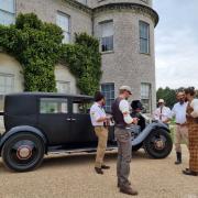 Jason Mamoa with his Rolls-Royce outside Goodwood house