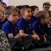 The school's reception class performed a song