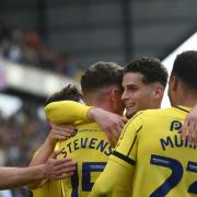 Ruben Rodrigues celebrates his second goal against Peterborough United