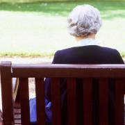 The pensioner was sitting on a bench (file photo).