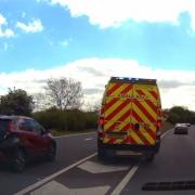 The ambulance dangerously changes lanes on the A34.
