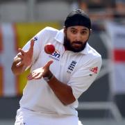 Monty Panesar takes a catch in a Test Match against New Zealand in 2013