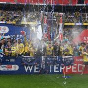 Oxford United players celebrate at Wembley