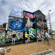 The new mural being painted on Bridge Street, Banbury