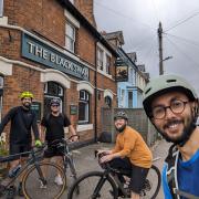 The cyclists outside The Black Swan