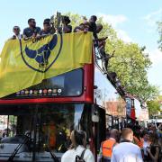 The open-top bus parade started at The Plain