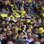 Oxford United fans get behind their team in the League One play-off final at Wembley