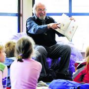 Ron Heapy reads to the children during the readathon