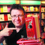 Charlie Hayes at Waterstones with the first book, Gangsta Granny