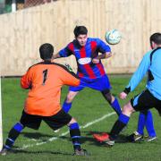 Woodstock's Nathan Lawes puts pressure on Village Inn keeper Colin Fell