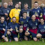 Highfield Social Club celebrate with the Ian Willoughby Cup after their 3-2 victory over Ashton Villa