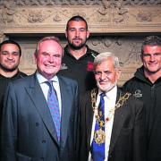 Lord Mayor Mohammed Abbasi with London Welsh chairman Bleddyn Phillips, front, and players Piri Weepu, Matt Corker and Tom May