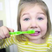 Should fluoride be put in water to prevent tooth decay?