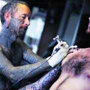 Tattoo artist Andreas Moore says he would never tattoo anyone’s hands, face or neck