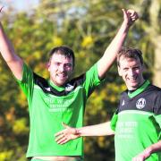 Forest Hill’s Craig Watts, left, is delighted to get on the scoresheet against Railway Wheatley, who emerged 6-1 victors