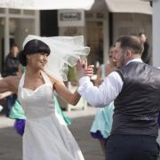 The Wedding Dancers get in the swing of things at Bicester Village entertaining shoppers as they browse the bridal event at the outlet stores
