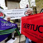 Action: From left, Darran Brown, Stephen Parkinson, Ellie Brown, Pol O Ceallaigh and Megan Dobney at an International Workers Day demo in Oxford’s Bonn Square in May