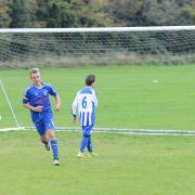 Radley’s Harry Haynes, centre, scores against Florence Park at Oxford Academy in their Under 13 clash