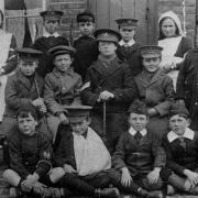 Wartime: Children living in Lime Walk, Headington, in 1915 pose for a photograph dressed up in army clothing to support the troops