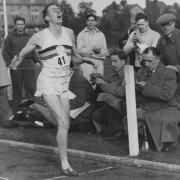 Roger Bannister breaking the four-minute mile in 1954